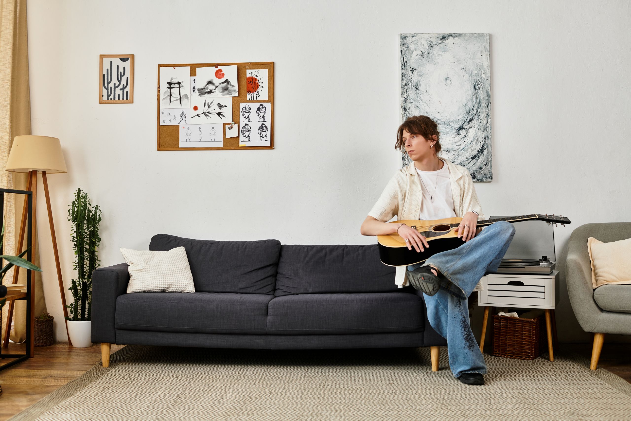 man trying to stay motivated to play guitar